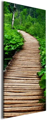 Produktbild von Wallario Premium Leinwandbild Holzweg im Wald in Größe 30 x 75 cm