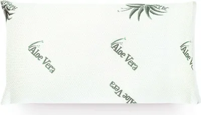 A white pillow with a repeating pattern of green aloe vera leaves and text.