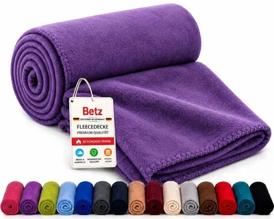 Produktbild von Betz Fleecedecke 130x170 cm 180g/m² – Weiche Wohndecke & Kuscheldecke – Flauschige Sofadecke Tagesdecke – Leicht, wärmend & pflegeleicht – Farbe Lila