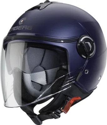 A blue matte Caberg Riviera V4 X Jethelm is shown from a three-quarter front angle against a white background.