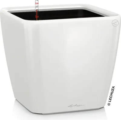 A white, square planter with a water level indicator.