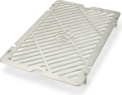 A stainless steel grill grate with a patterned design and a central logo.