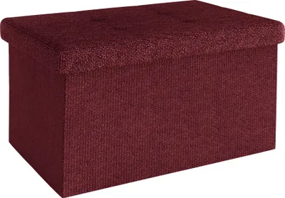 A studio shot of a burgundy fabric storage ottoman.