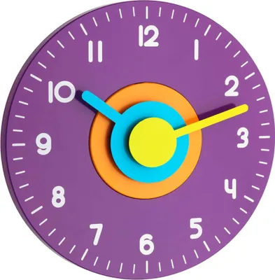 A close-up, studio shot of a colorful, modern wall clock.