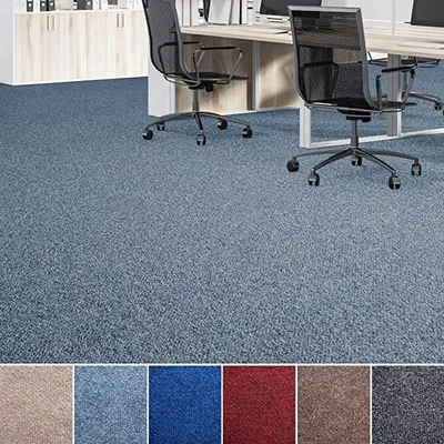 An office setting with blue carpet and office chairs.