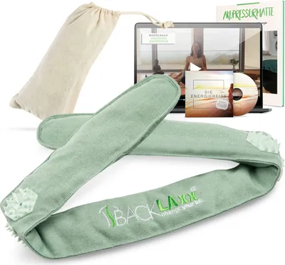 A set of acupressure products including a headband, a bag, a laptop displaying a video, and a CD.