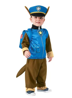 A child wearing a Paw Patrol Chase costume, standing against a white background.
