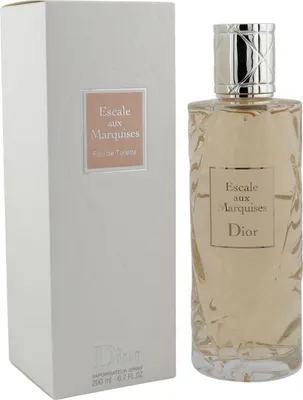 Dior Escale aux Marquises Eau de Toilette Flakon neben weißer Verpackung mit rosa Etikett und silberner Schrift.