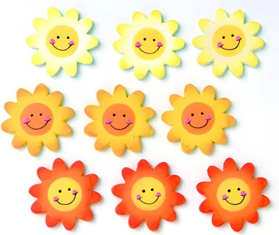 A top-down view of nine decorative sun shapes arranged in three rows on a white background.