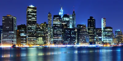Produktbild von Tulup Glas-Bild -140x70- Wandkunst Dekorative Wand für Küche & Wohnzimmer - Sehenswürdigkeiten & Architektur - Manhattan New York - Blau