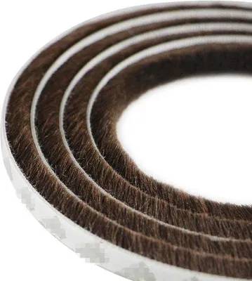 Immagine prodotto di Nastro sigillante da 5 metri - Strisce autoadesive a spazzola - Per finestre e porte - 9 x 23 mm - Adatto per scanalature da 9-20 mm - Marrone - Lunghezza: 5 metri