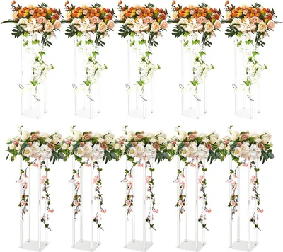 A set of ten acrylic flower stands with floral arrangements.