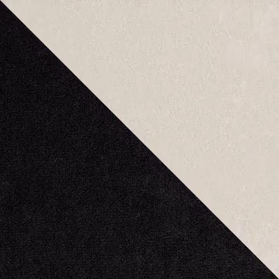 A diagonal split between black and beige fabric.