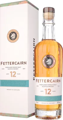 A bottle of Fettercairn 12 Year Old Highland Single Malt Scotch Whisky and its matching gift box are displayed against a white background.