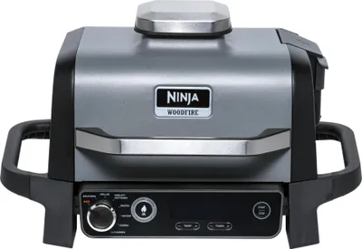 A studio shot of a Ninja Woodfire outdoor grill.