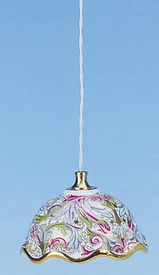 A hanging lamp with a decorative porcelain shade.