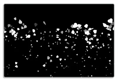 Produktbild von Wallario Frühstücksbrettchen aus Glas 20 x 30 cm mit rutschfesten Füßen, Motiv Weiße Konfetti-Herzen vor schwarzem Hintergrund
