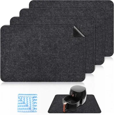 Produktbild von Hittebestendige maten für Küchenarbeitsplatten und Friteusen - Set aus 4 - Hitzeisoliermatten - Schutz für Kaffeemaschinen und Mikrowellen - 30 x 44 cm