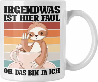 Produktbild von Trendation - Lustige Tasse Irgendwas Ist Hier Faul Geschenk Spruch Faultier Kollegein Kollege Geschenkidee Freundin Freund (Weiß)