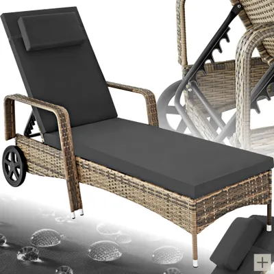 A rattan sun lounger with a gray cushion and headrest, shown on a light gray background with water droplet graphics.