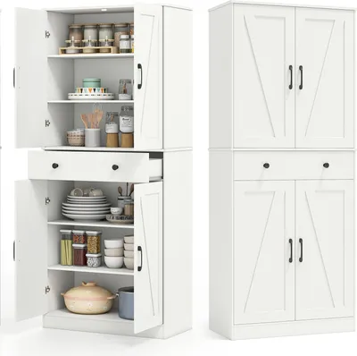 A white kitchen cabinet with its doors open, showing shelves stocked with various kitchen items.