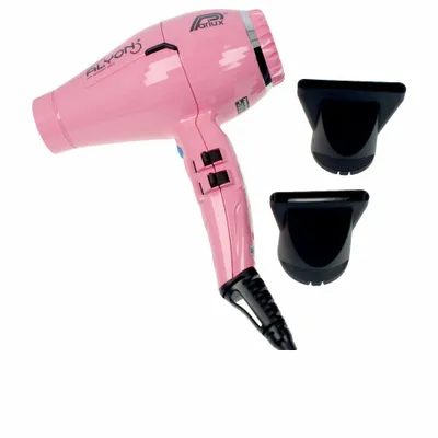 A pink Parlux ALYON hair dryer with two black nozzle attachments on a white background.