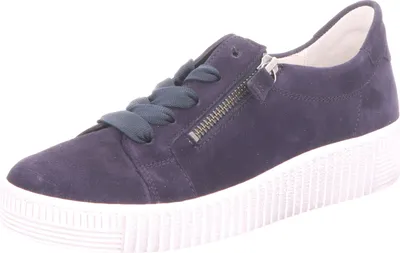 A single blue sneaker with a white sole is shown against a white background.