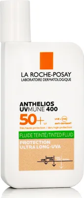 A product shot of a sunscreen bottle against a white background.