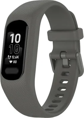 A close-up of a dark gray Garmin Vivosmart 5 fitness tracker on a white background.