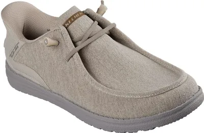 A single tan shoe is shown against a white background.