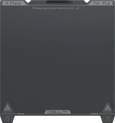 A flat, dark gray build plate for a 3D printer.