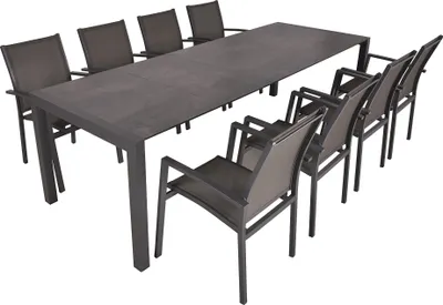 A dining table with chairs, set against a white background.