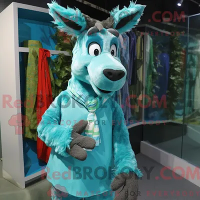 Image de Personnage mascotte REDBROKOLY d un âne turquoise habillé d une robe droite et d écharpes