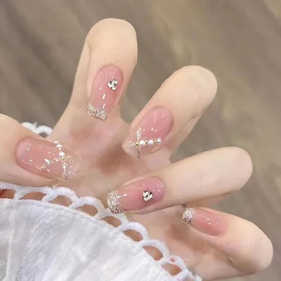 Immagine prodotto di set di 24 unghie artificiali rosa glitterate per manicure fai da te