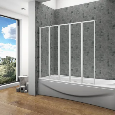 A modern bathroom with a bathtub and a folding shower screen.