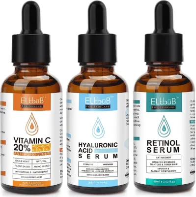 Three bottles of skincare serum arranged side-by-side on a white background.