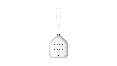 A white, house-shaped Christmas ornament with a hanging loop and a grid of small holes on its front.