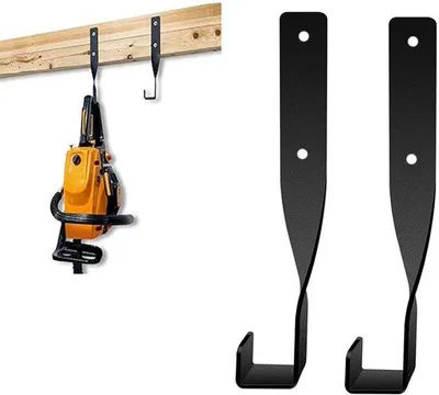 Produktbild von Zweischieniger Kettenzaugschutz für Kettenzauger, robuste Ausführung, Wandhalterung für Kettenzauger, multifunktionale Klappe, schwarz