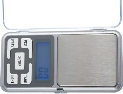 A top-down view of a small, silver digital scale with a clear lid.
