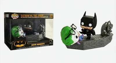 A product box and the product itself, a Funko Pop! Movie Moments figure set of Batman vs. The Joker.