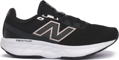 A side view of a black New Balance running shoe with a white sole.