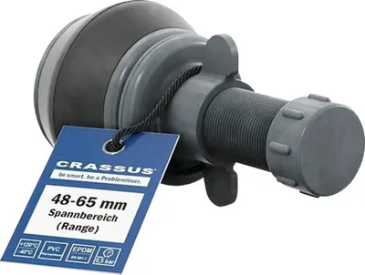 A close-up studio shot of a plumbing part with a tag.