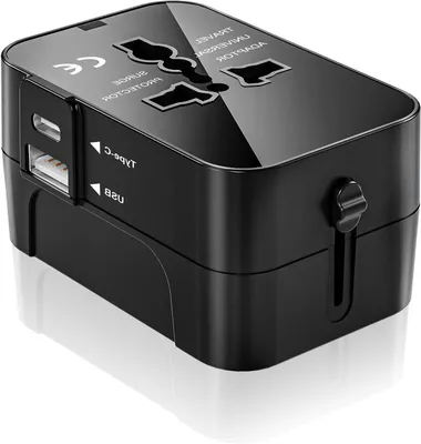 Produktbild von Universeller Reiseadapter – Weltsteckdosenadapter – Für internationale Reisen – Kompatibel mit über 200 Ländern – 8x5x4 cm – Schwarz