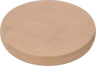 A round wooden cutting board on a white background.