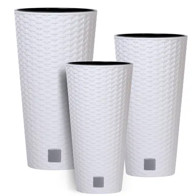 Three white rattan-style planters of varying heights are arranged together against a white background.