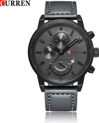 A close-up studio shot of a men's wristwatch against a white background.
