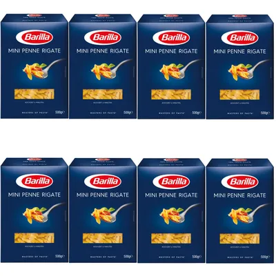 Eight boxes of Barilla Mini Penne Rigate pasta are arranged in two rows of four.
