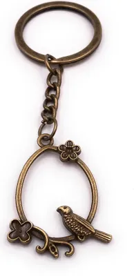 Imagen del producto de Llavero Onwomania con forma de pájaro y flores en círculo, diseño de animal (pájaro), color bronce