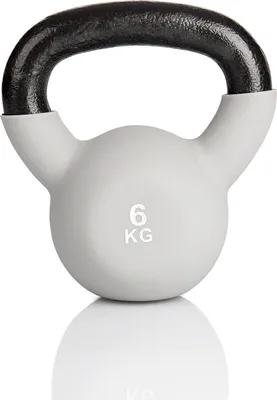 A kettlebell is shown in a studio setting with a white background and reflection.