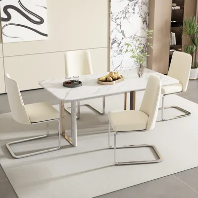 A dining set with a marble-top table and four beige chairs in a modern dining room.